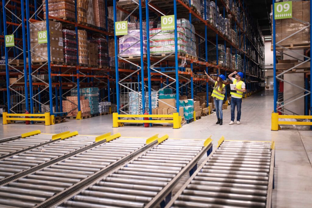 Warehouse Workers checking Inventory loaded on Storage Mezzanine